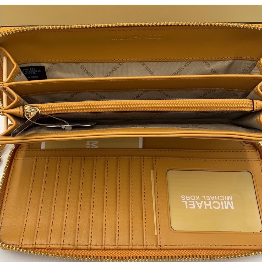 Michael Kors travel wallet with wristlet.